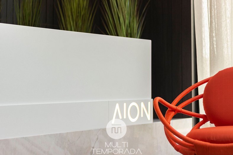 Apartamento 303 no Aion Suítes: Elegância e Vista para o Mar